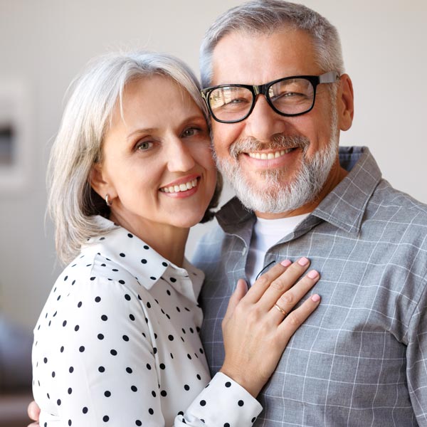 smiling middle aged couple